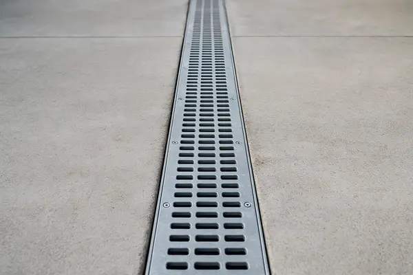 a brand new french drain from Dallas French Drain Installation in Dallas, TX - laying a french drain